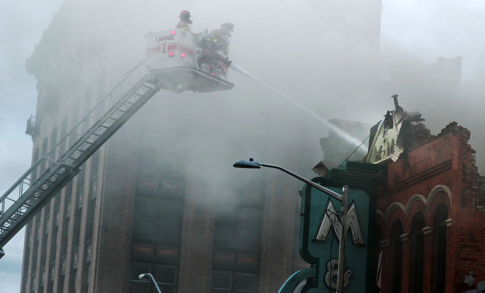 Smoke envelopes firefighters